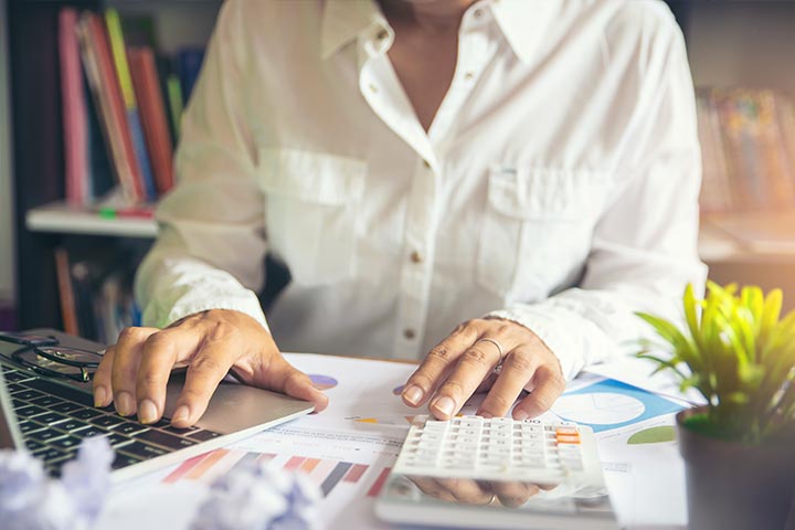 A financial advisor reviewing cash flow and debt management details.